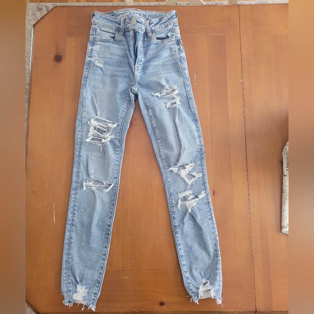 American Eagle Distressed Light Blue / Light Wash Jeans